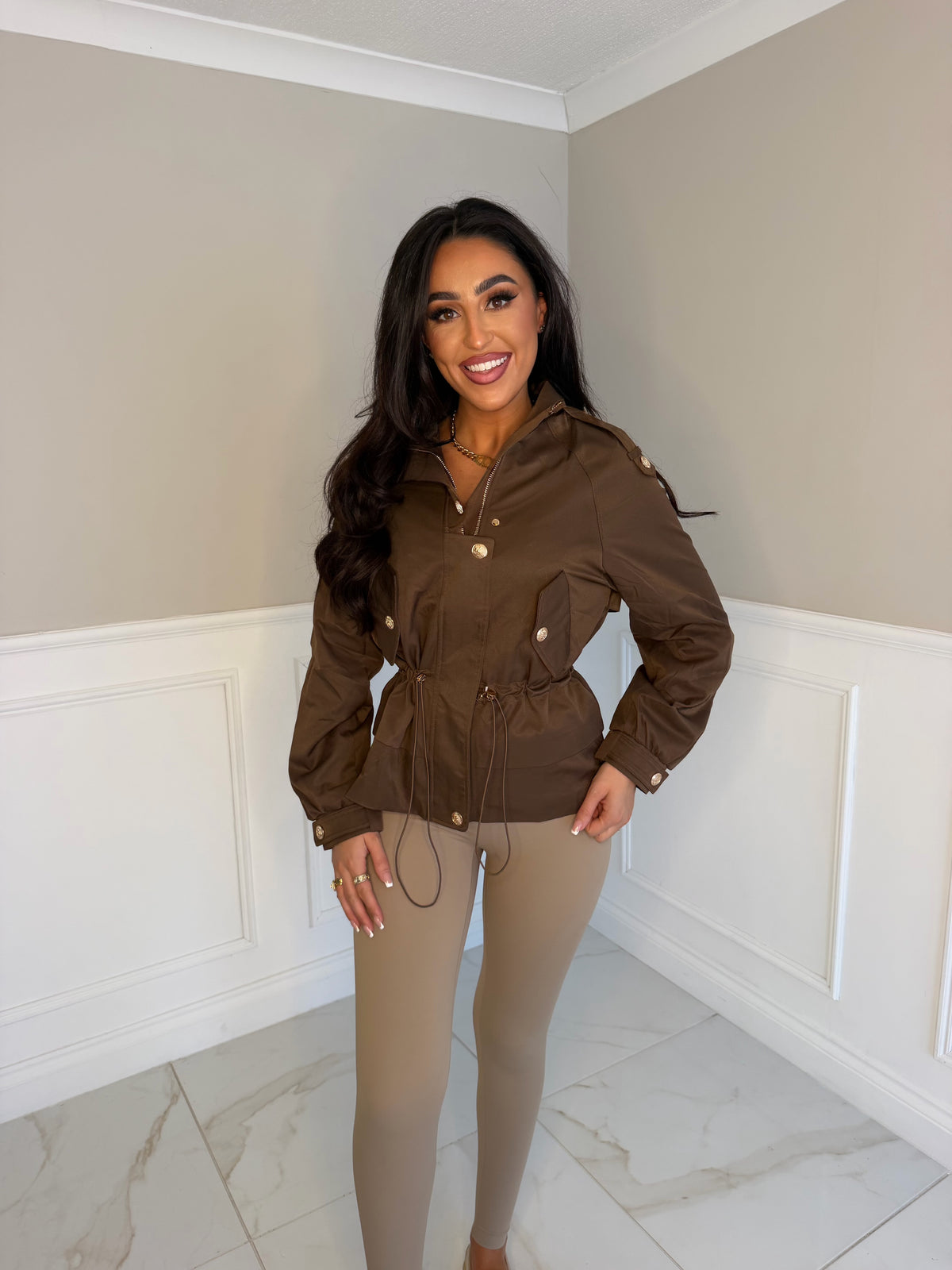 Gold button pull string Parker jacket